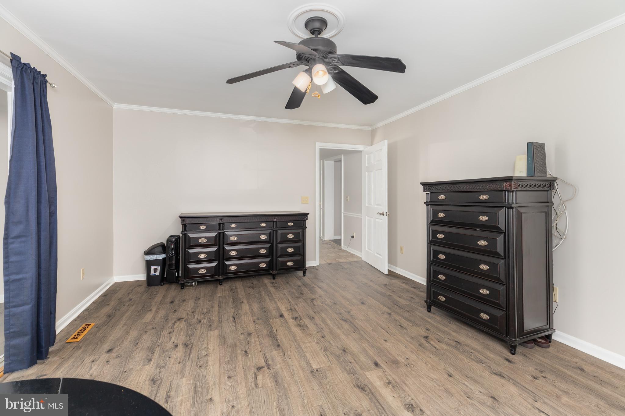 35588 Lizzard Hill Road Frankford, DE 19945 - Photo 23 of 39 a living room with furniture and a wooden floor