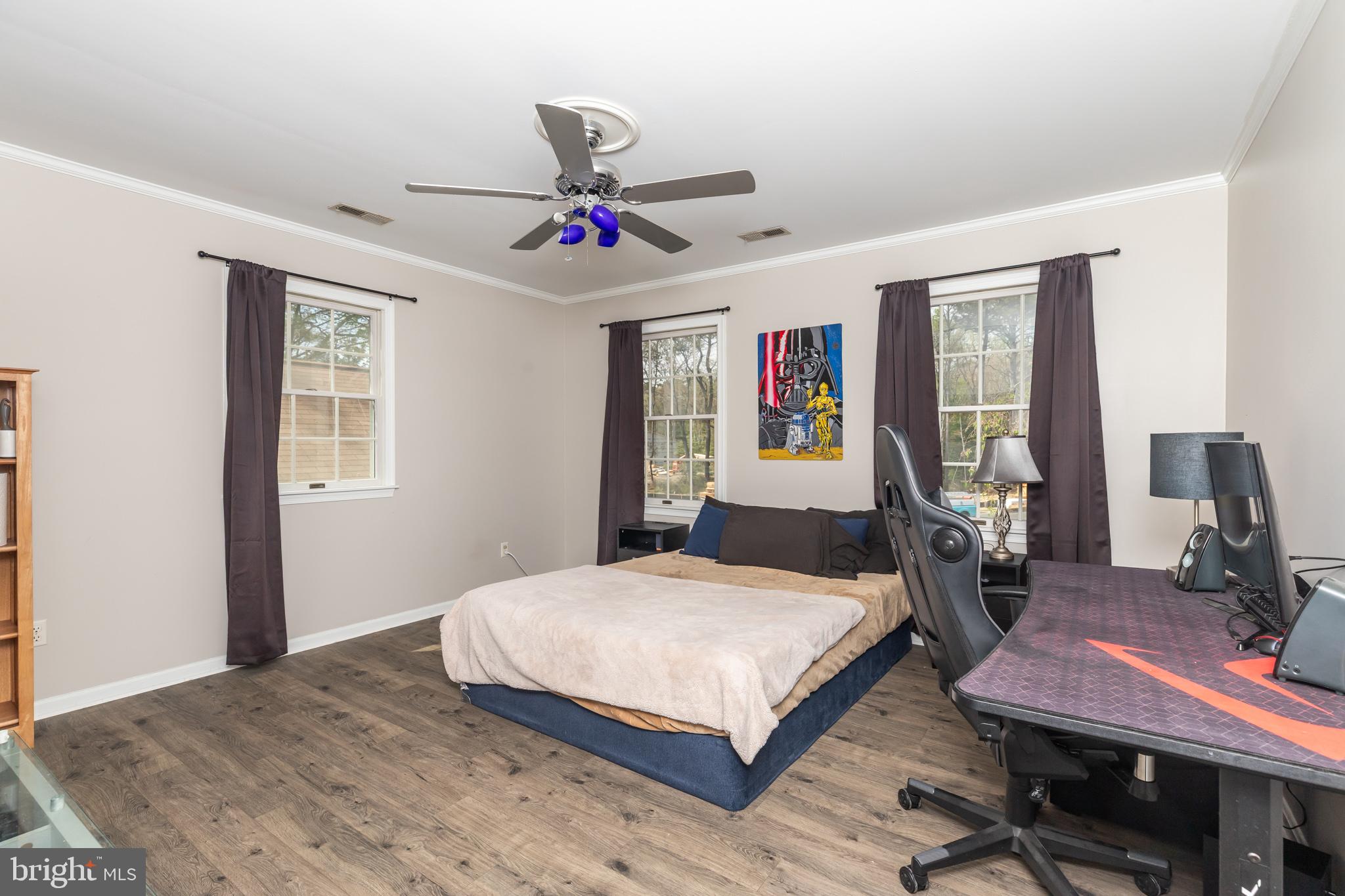 35588 Lizzard Hill Road Frankford, DE 19945 - Photo 25 of 39 a bedroom with a bed and a desk