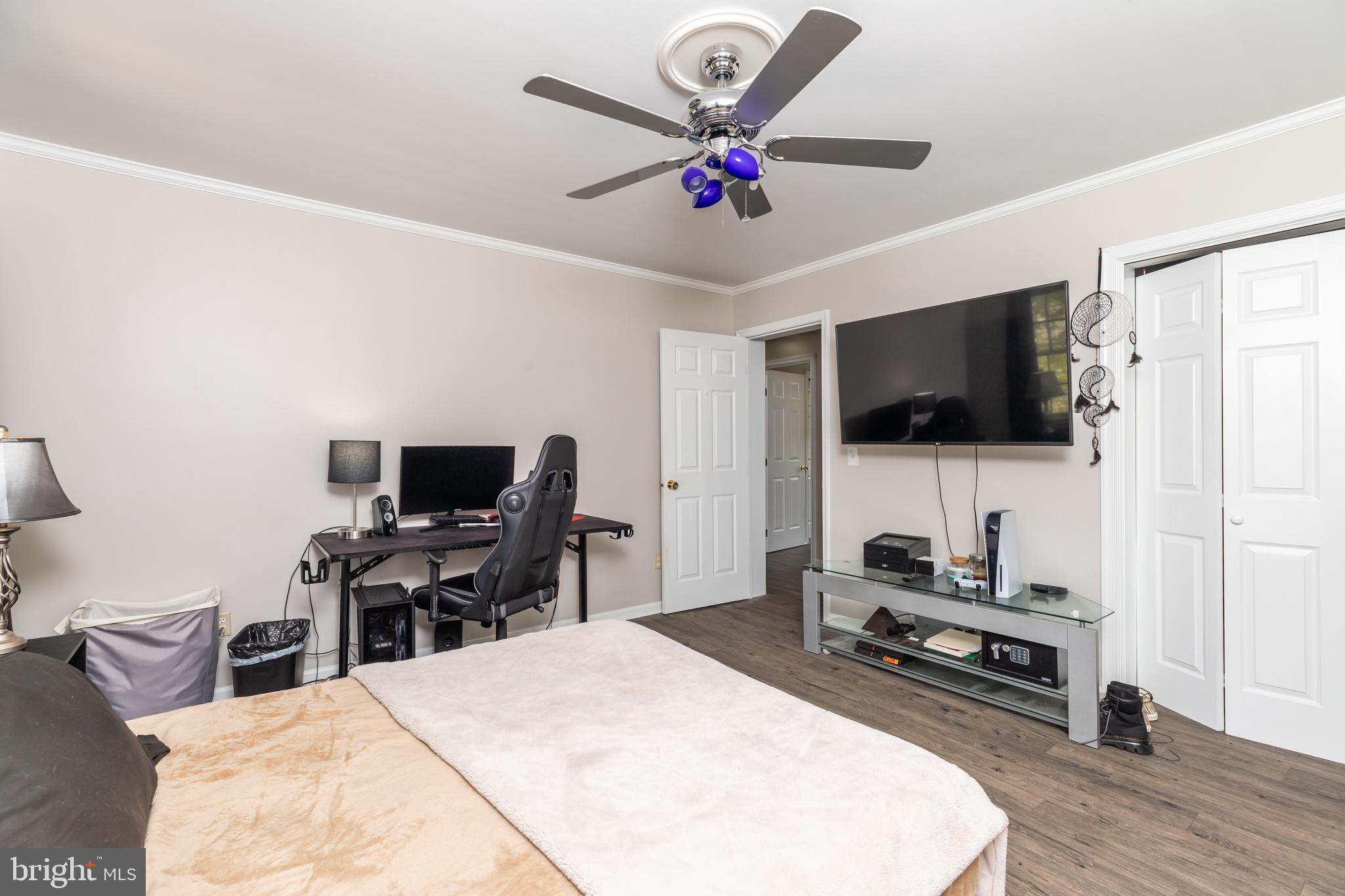 35588 Lizzard Hill Road Frankford, DE 19945 - Photo 26 of 39 a bedroom with a bed and a flat screen tv