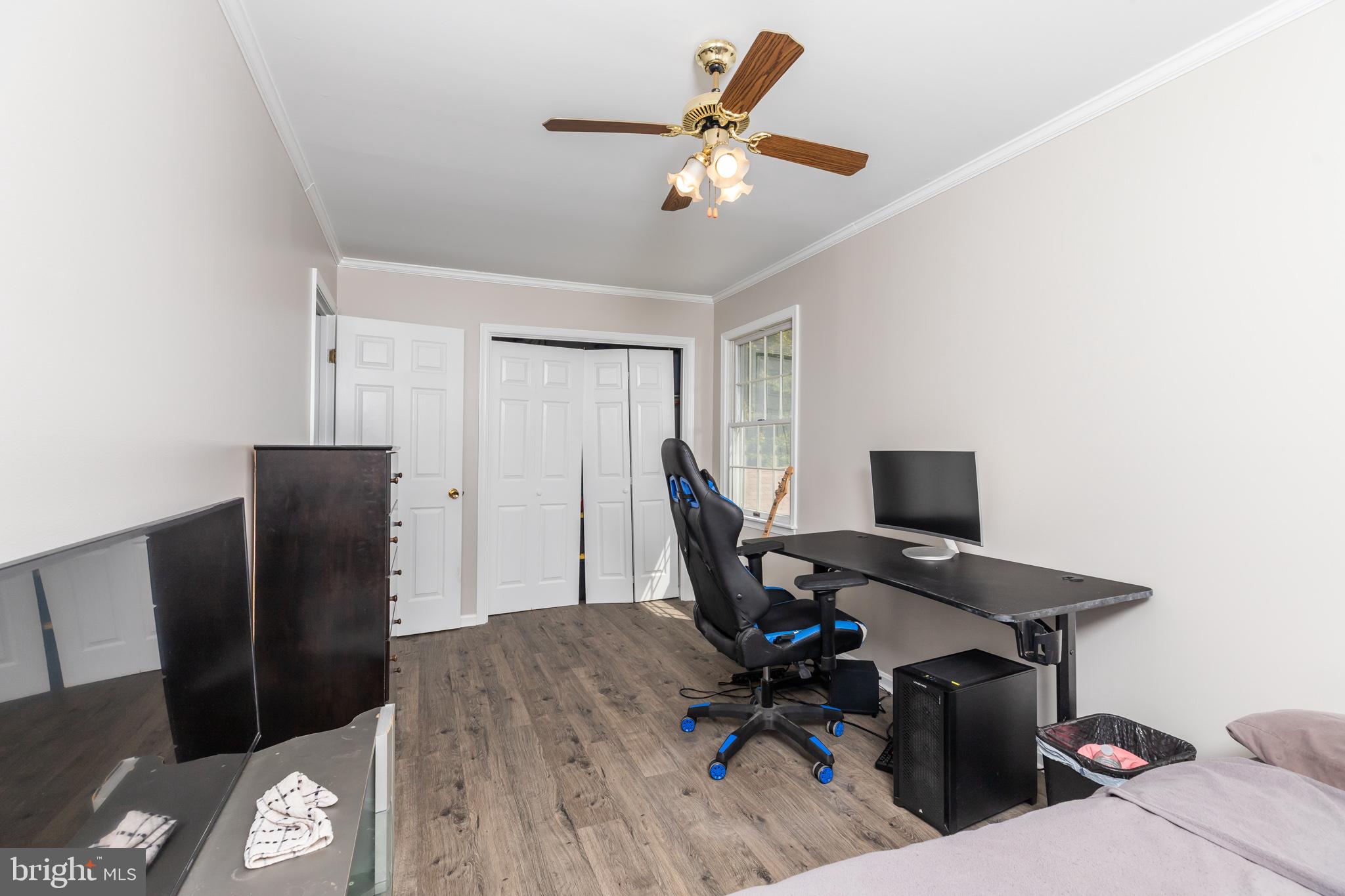35588 Lizzard Hill Road Frankford, DE 19945 - Photo 28 of 39 a workspace with furniture and wooden floor