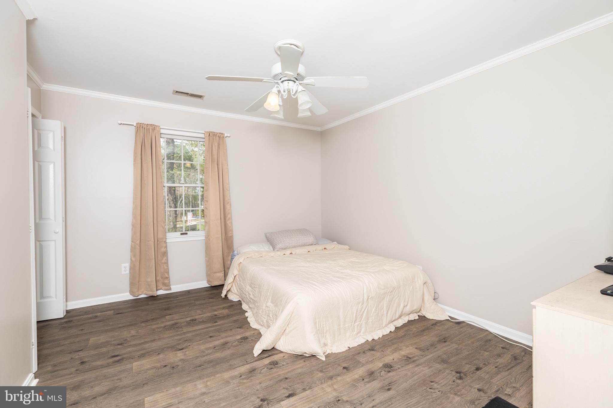 35588 Lizzard Hill Road Frankford, DE 19945 - Photo 29 of 39 a bedroom with a bed and a window