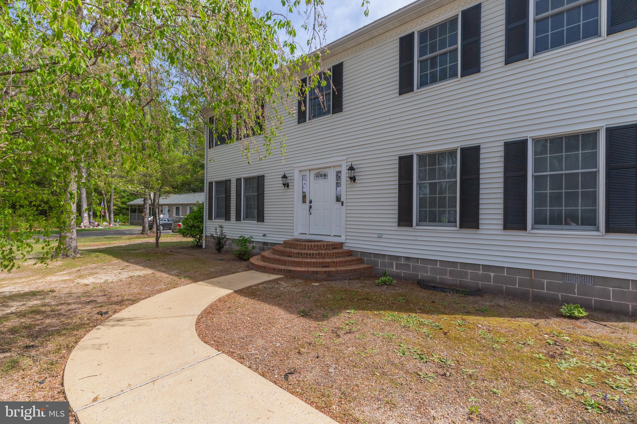 35588 Lizzard Hill Road Frankford, DE 19945 - Photo 3 of 39 a view of a house with backyard and sitting area