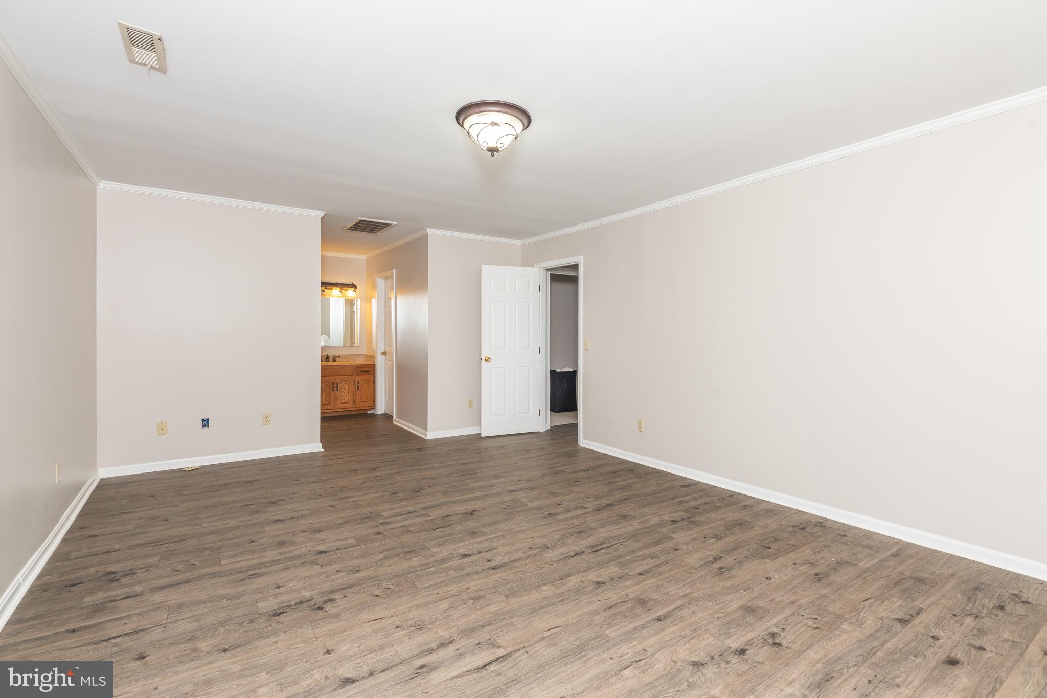 35588 Lizzard Hill Road Frankford, DE 19945 - Photo 32 of 39 a view of an empty room with wooden floor