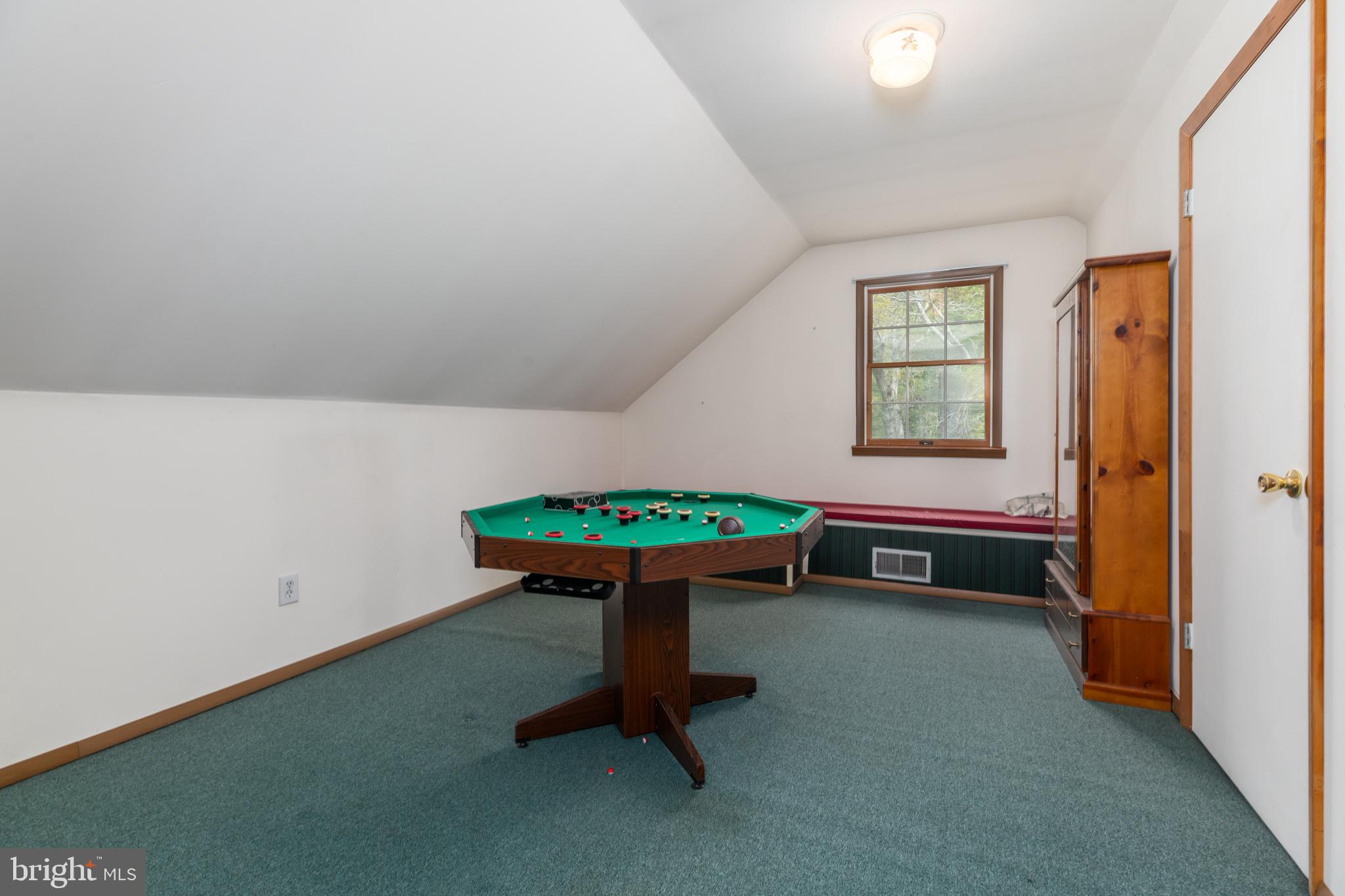 35588 Lizzard Hill Road Frankford, DE 19945 - Photo 37 of 39 a room that has a bed and a table in it