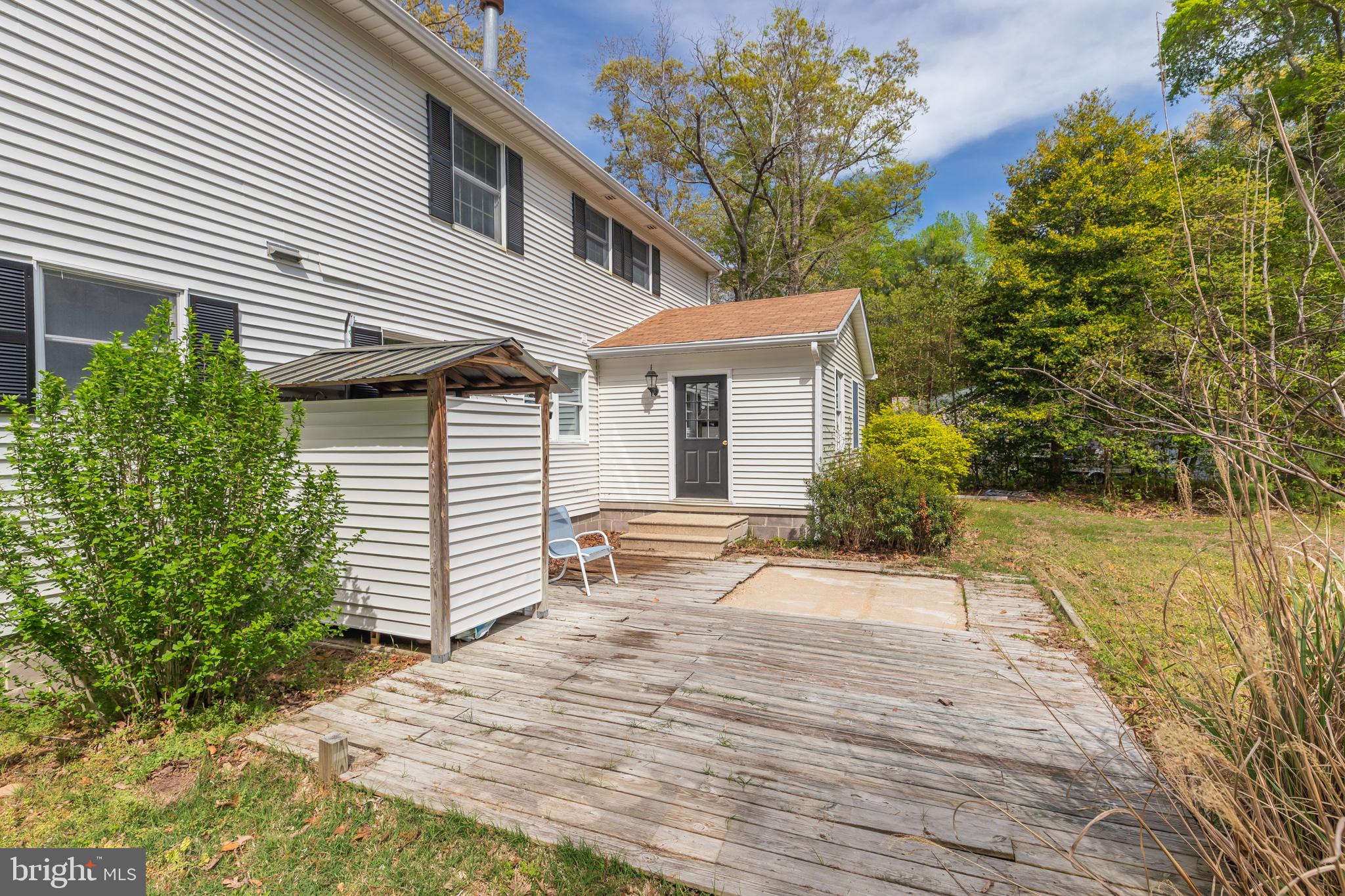 35588 Lizzard Hill Road Frankford, DE 19945 - Photo 7 of 39 a view of a backyard of the house