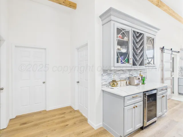 a view of a bathroom with a sink and a window