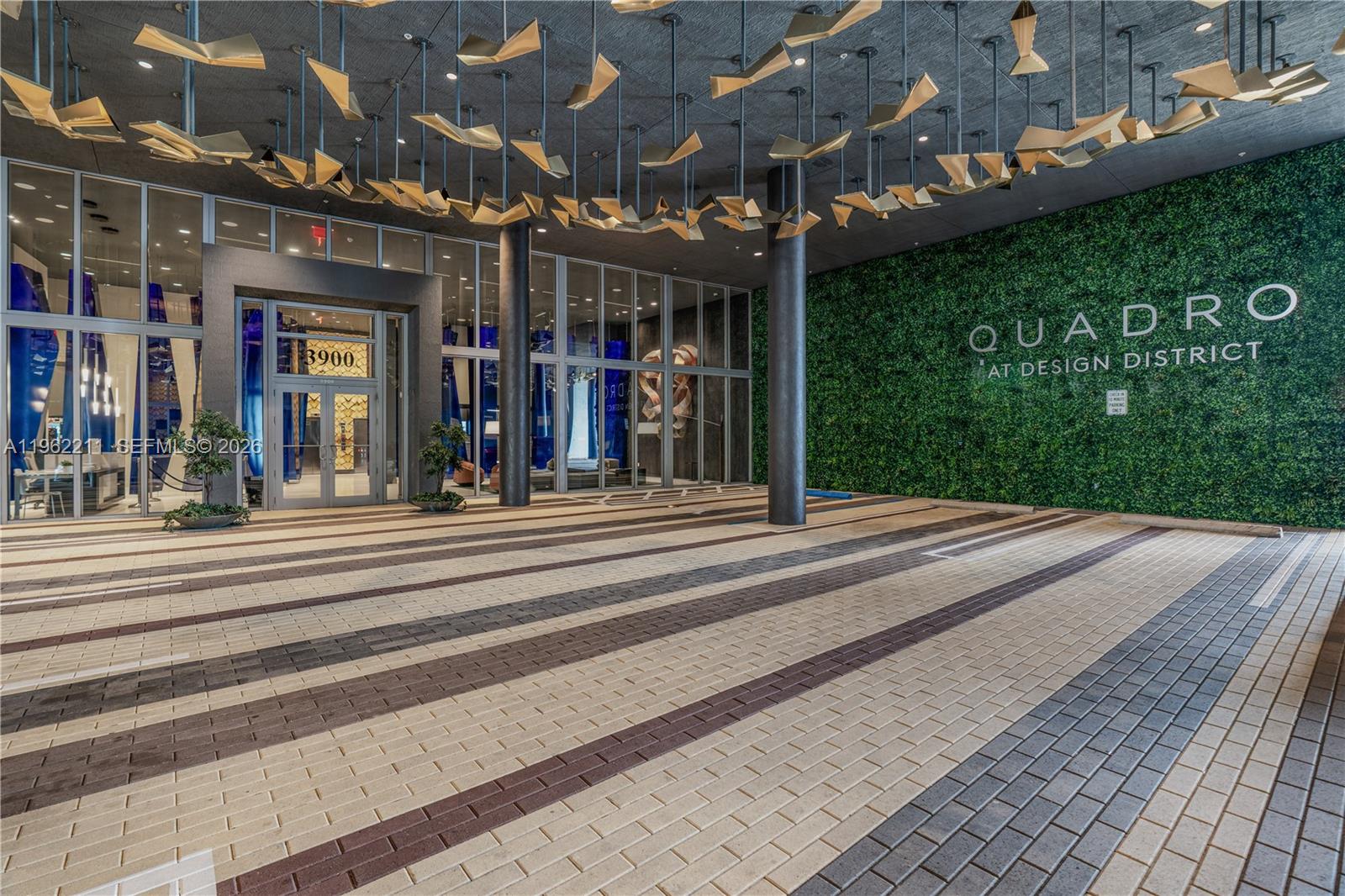 3900 Biscayne Boulevard, Unit S904 Miami, FL 33137 - Photo 13 of 43 a view of a pathway along a building