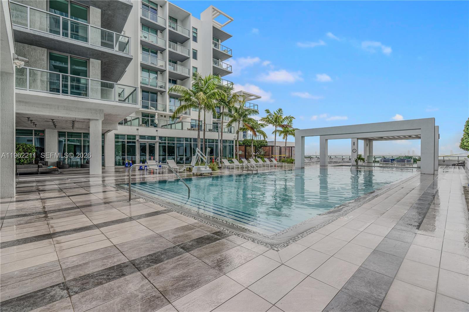 3900 Biscayne Boulevard, Unit S904 Miami, FL 33137 - Photo 21 of 43 a view of pool with outdoor seating