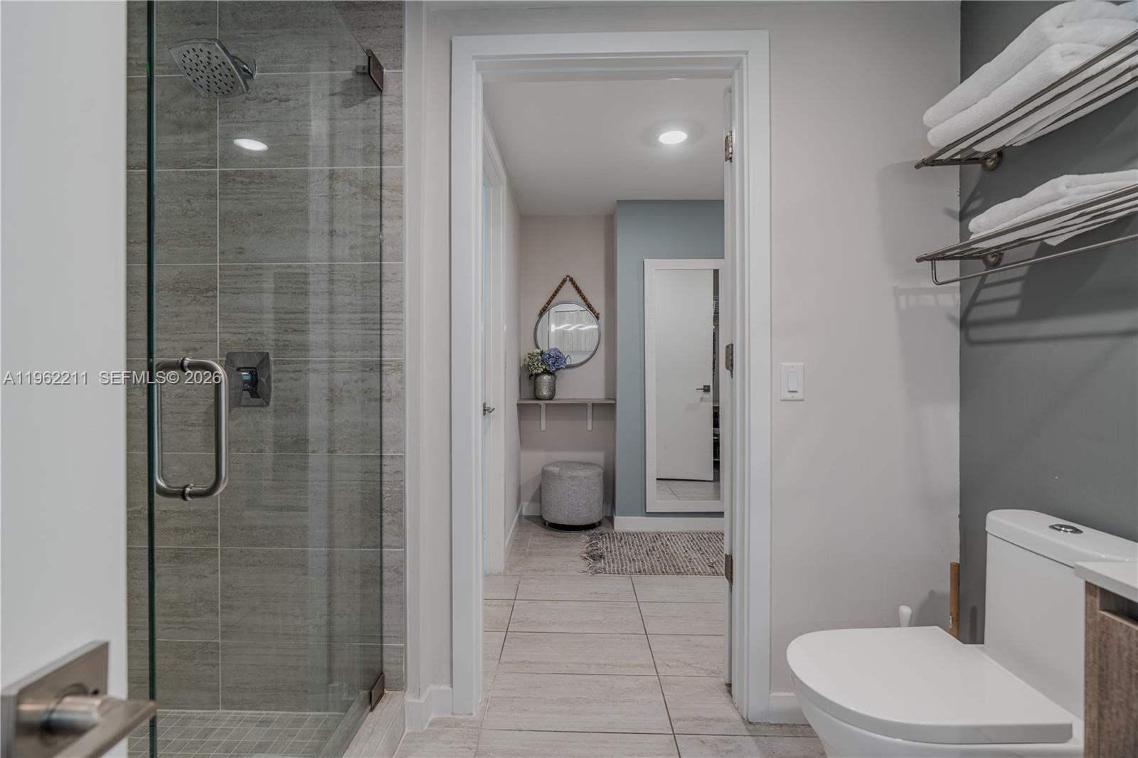 3900 Biscayne Boulevard, Unit S904 Miami, FL 33137 - Photo 25 of 43 a bathroom with a toilet and shower