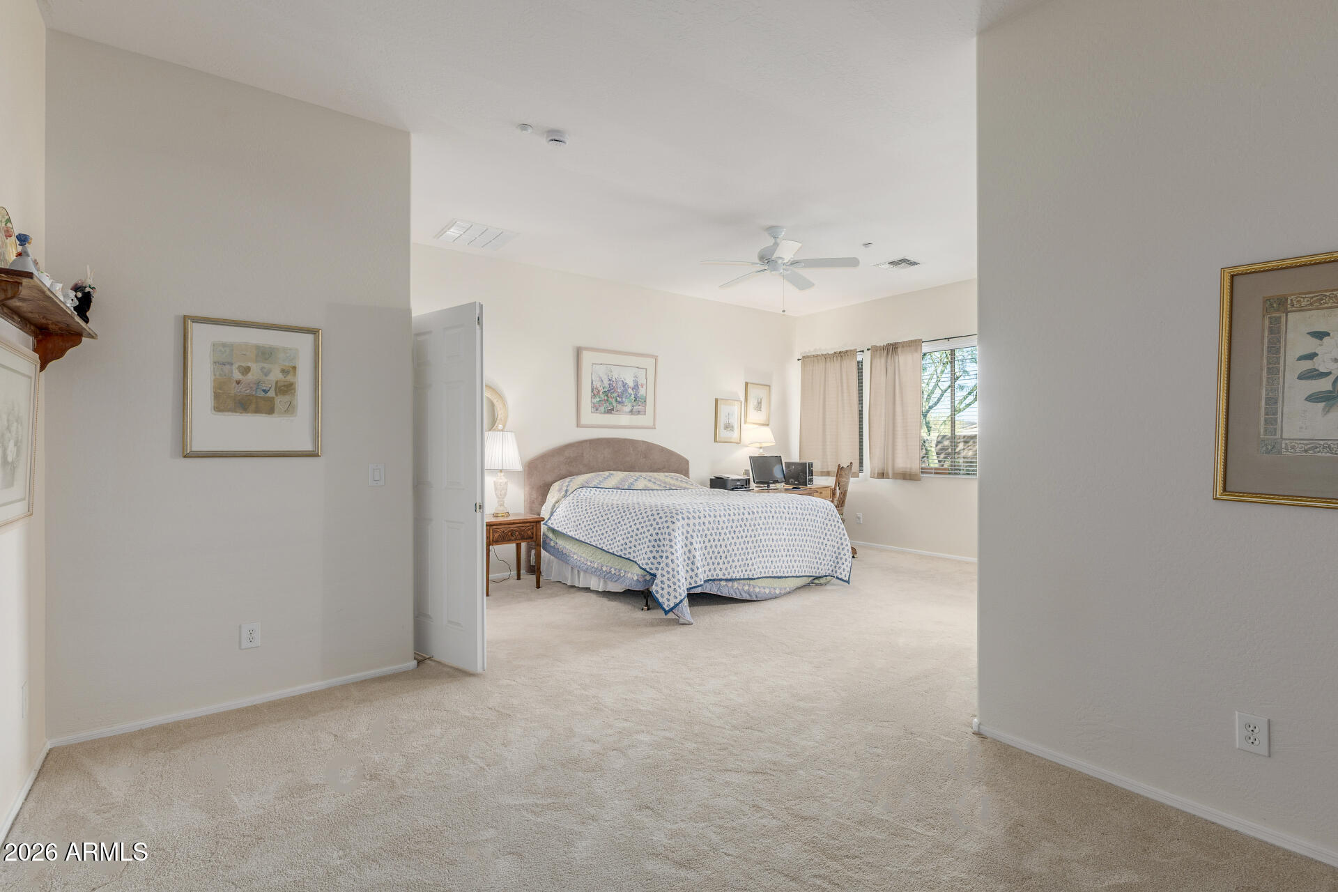 12731 West Eagle Ridge Lane Peoria, AZ 85383 - Photo 15 of 88 a bedroom with a bed and a night stand