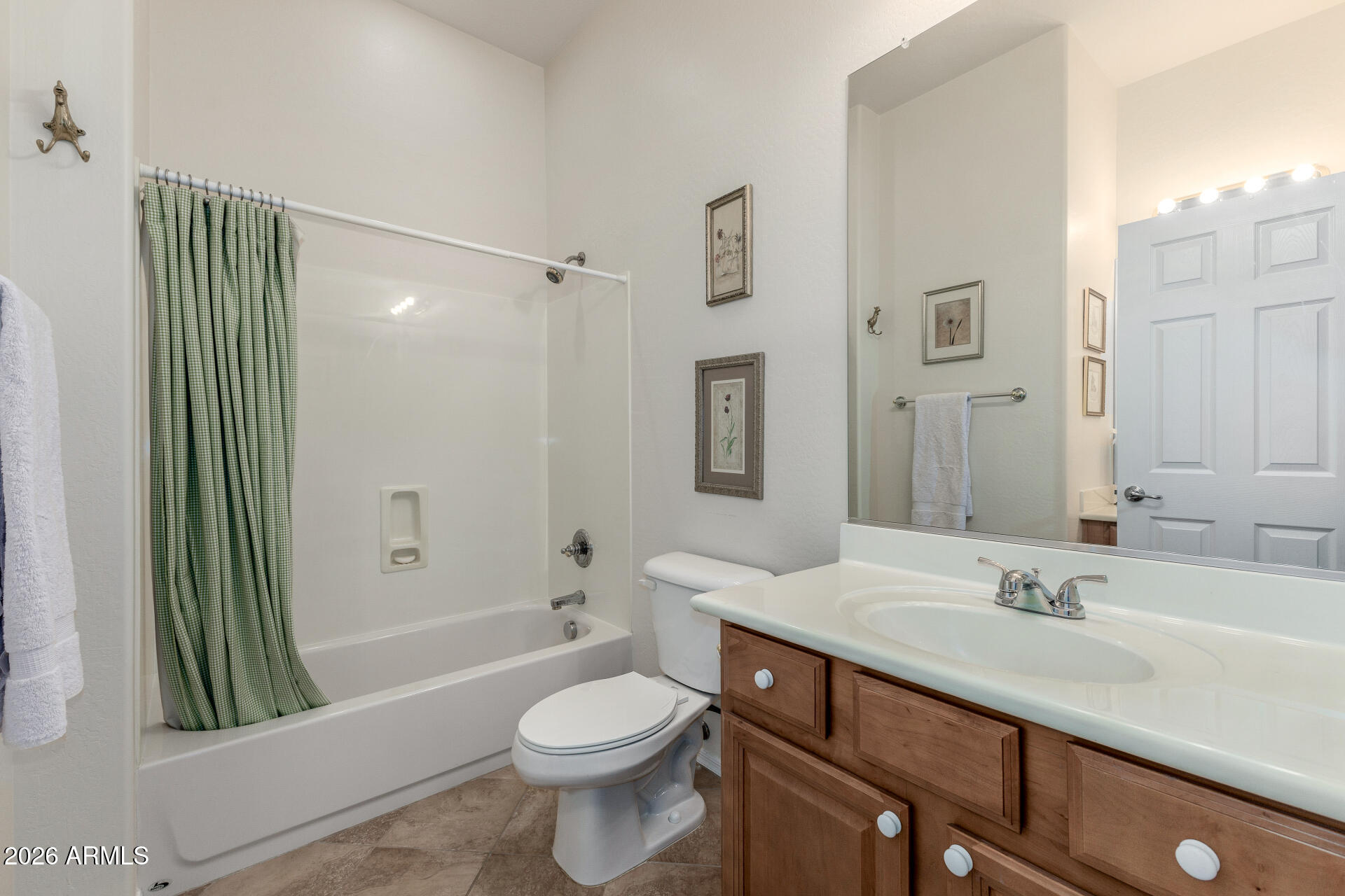 12731 West Eagle Ridge Lane Peoria, AZ 85383 - Photo 23 of 88 a bathroom with a double vanity sink toilet and shower