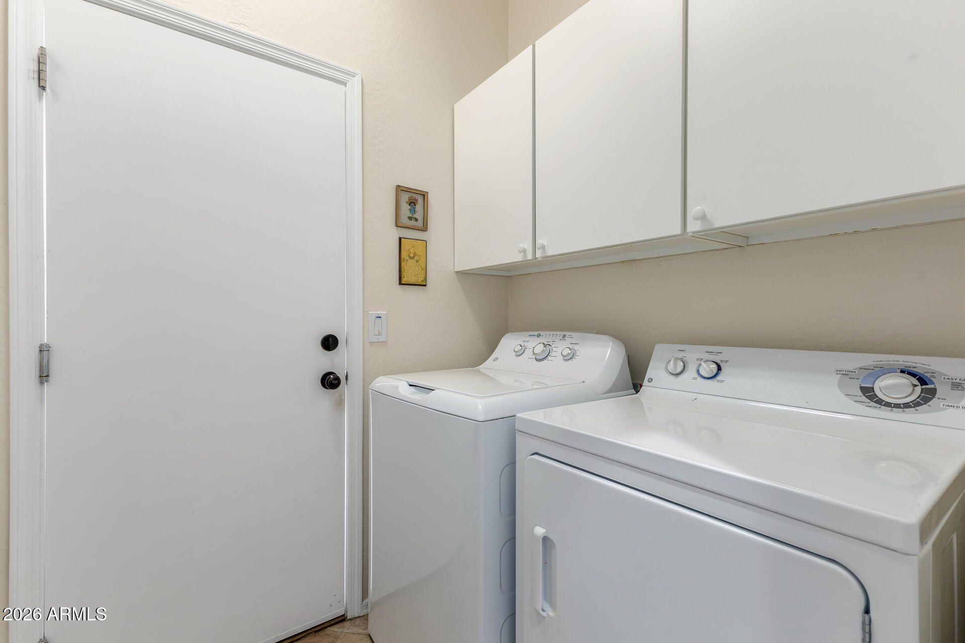 12731 West Eagle Ridge Lane Peoria, AZ 85383 - Photo 24 of 88 a utility room with dryer and washer