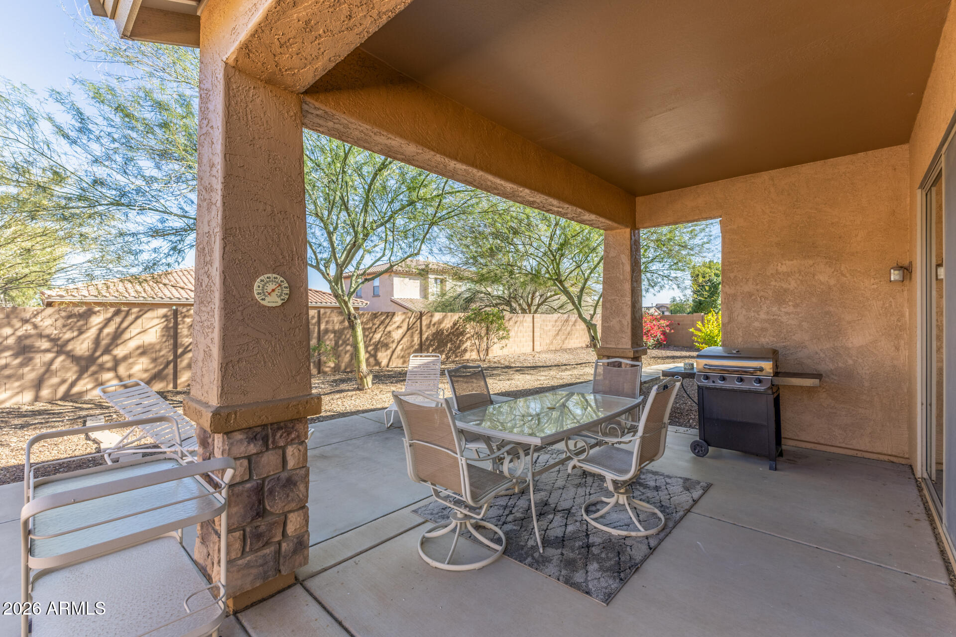 12731 West Eagle Ridge Lane Peoria, AZ 85383 - Photo 25 of 88 a dining room with furniture and large windows