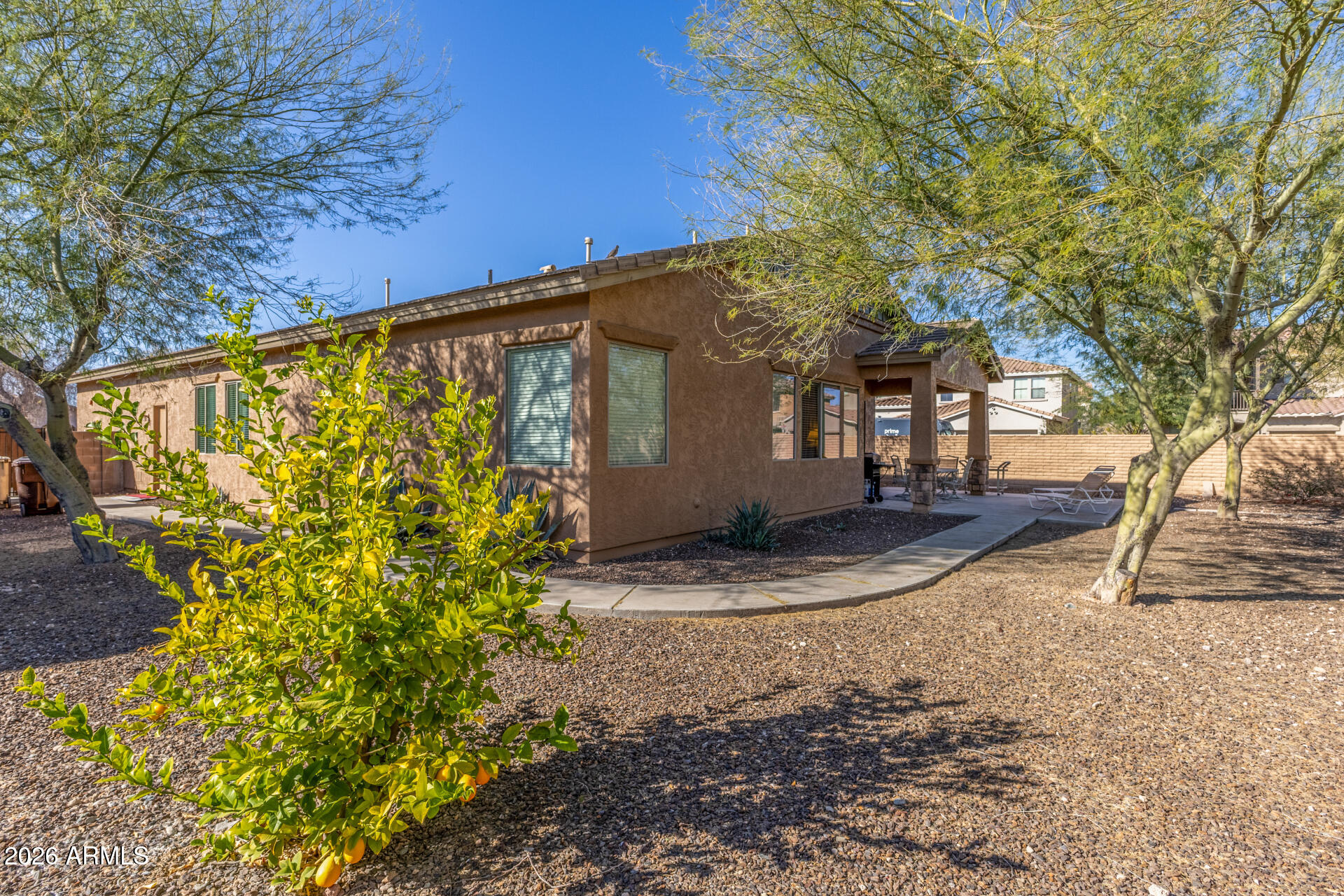 12731 West Eagle Ridge Lane Peoria, AZ 85383 - Photo 27 of 88 a view of a yard with plants and trees