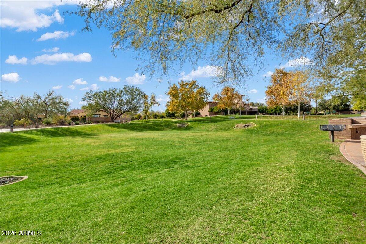 12731 West Eagle Ridge Lane Peoria, AZ 85383 - Photo 54 of 88 a backyard of a house with lots of green space