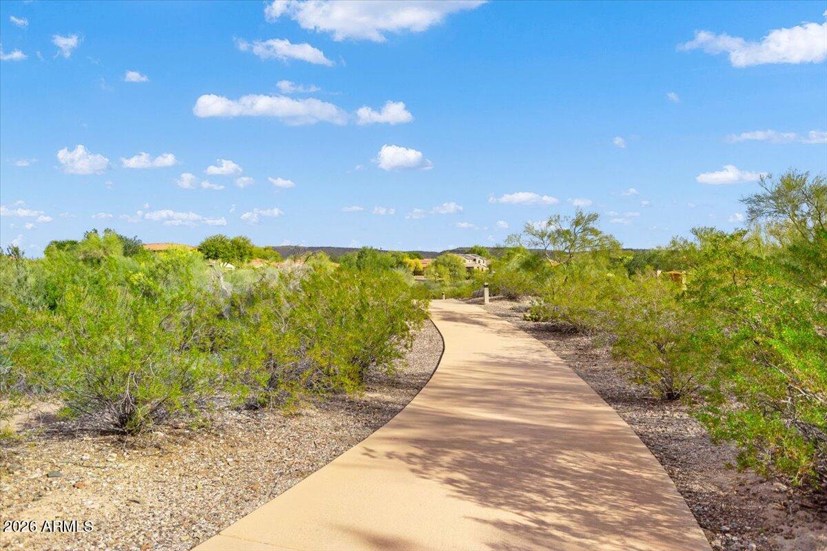12731 West Eagle Ridge Lane Peoria, AZ 85383 - Photo 56 of 88 a view of a pathway with a yard