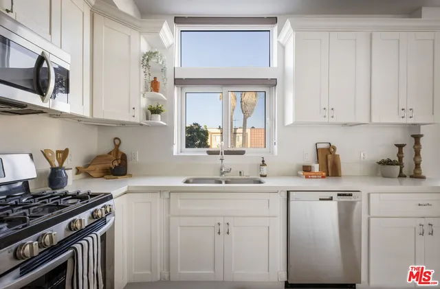 a view of dining table chairs and entryway