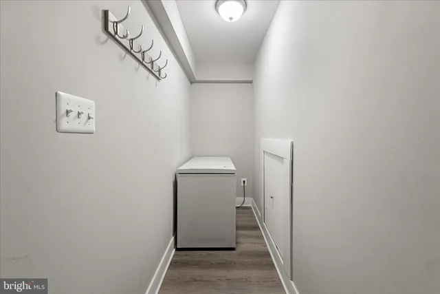 an aerial view of a houses with a yard and lake view