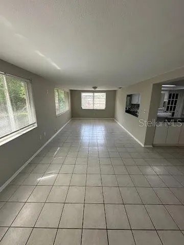 a view of hallway with windows