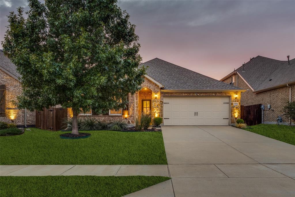 413 Yellowstone Drive Celina, TX 75009 - Photo 1 of 33 a front view of house with yard and green space