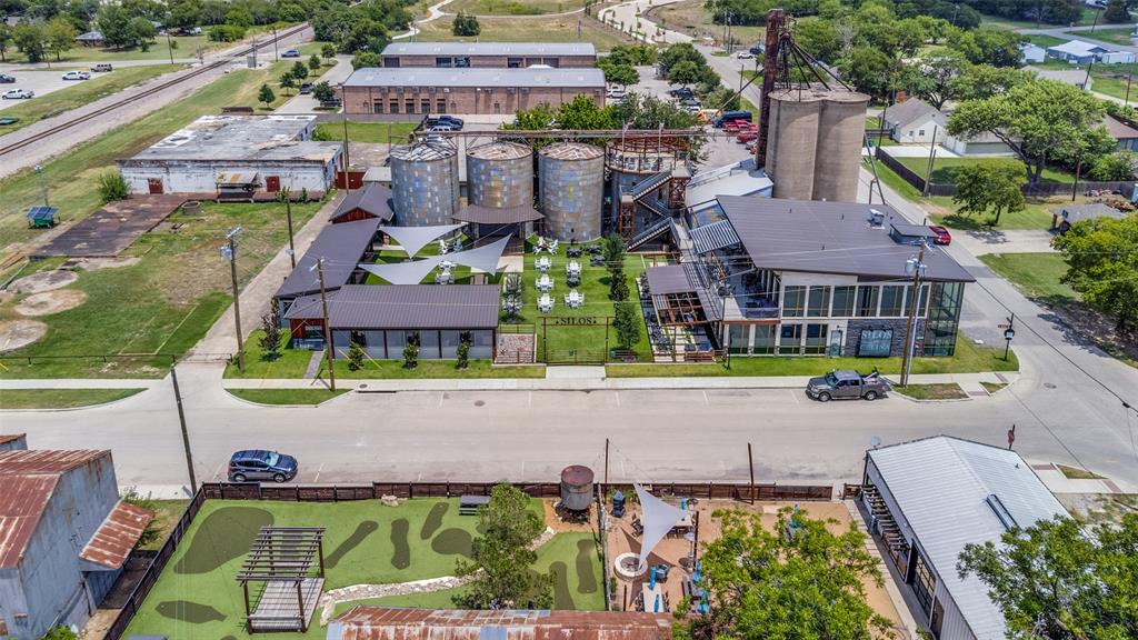 413 Yellowstone Drive Celina, TX 75009 - Photo 31 of 33 an aerial view of a house with a garden potted plants