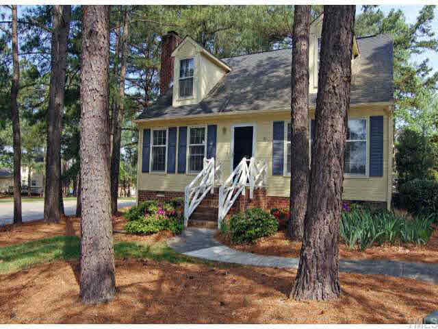 134 Wythe Circle Raleigh, NC 27615 - Photo 1 of 10 a front view of a house with garden