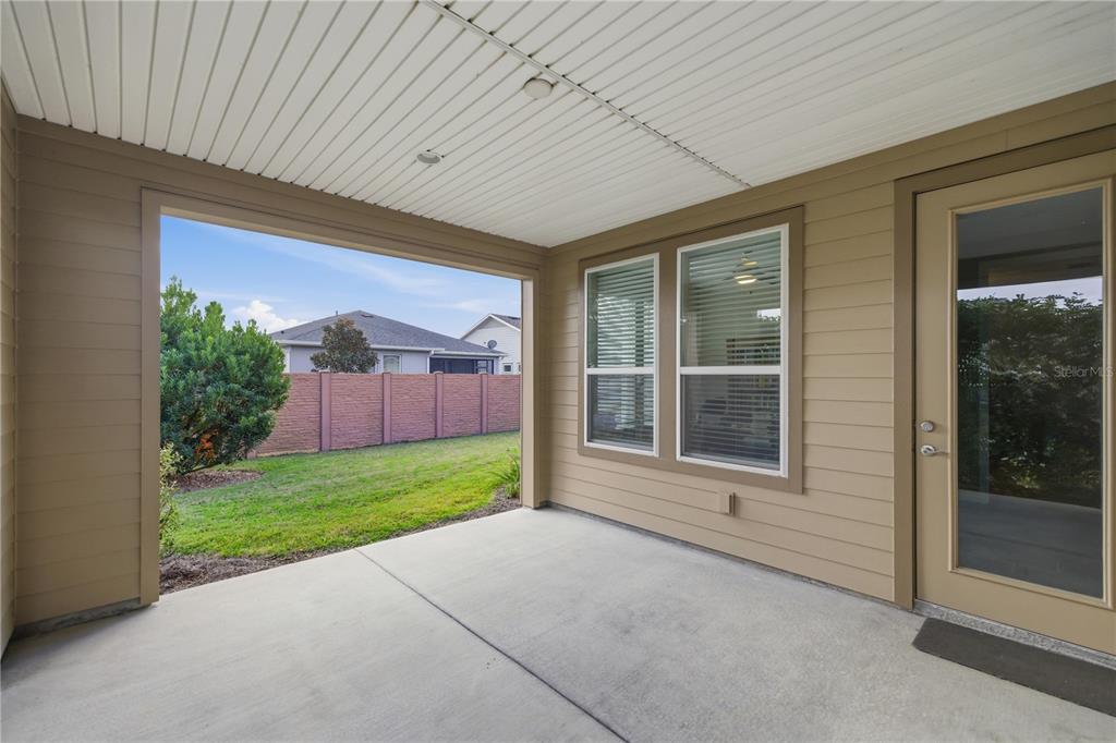 5504 Northwest 40th Loop Ocala, FL 34482 - Photo 24 of 31 front view of a house with a yard