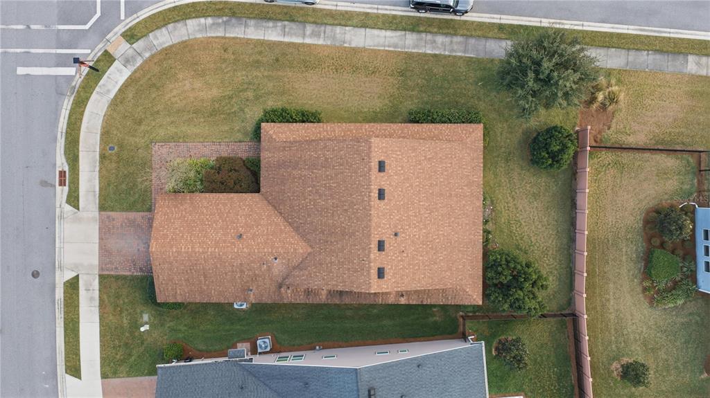 5504 Northwest 40th Loop Ocala, FL 34482 - Photo 31 of 31 an aerial view of a house with garden space and swimming pool