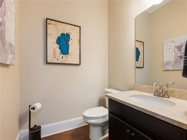 a view of walk in closet with clothes