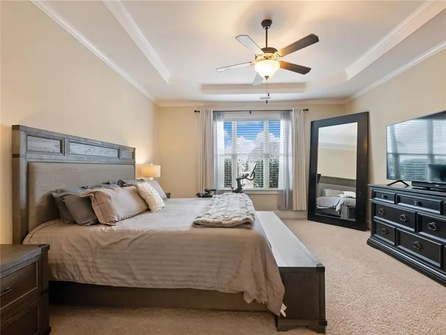 a room with furniture and flat screen tv