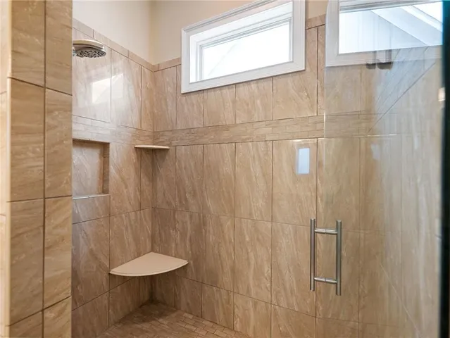 a bed room with a bed and a chandelier