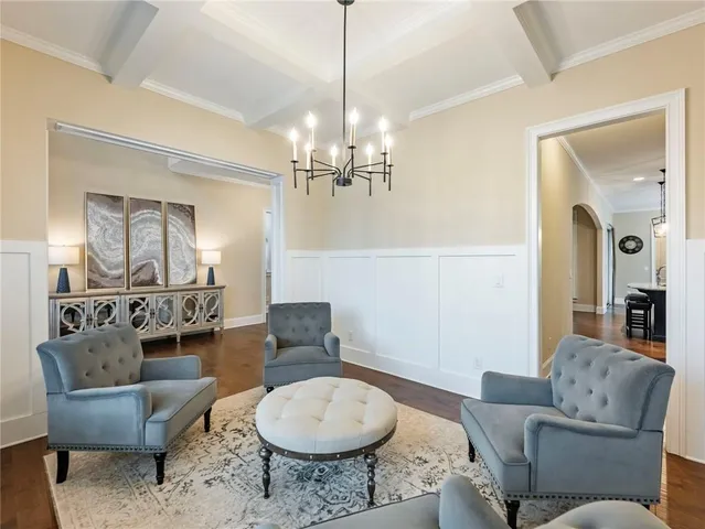 a view of an entryway with wooden floor