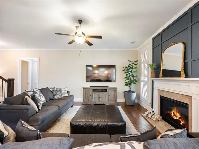 a kitchen with kitchen island a sink table and chairs
