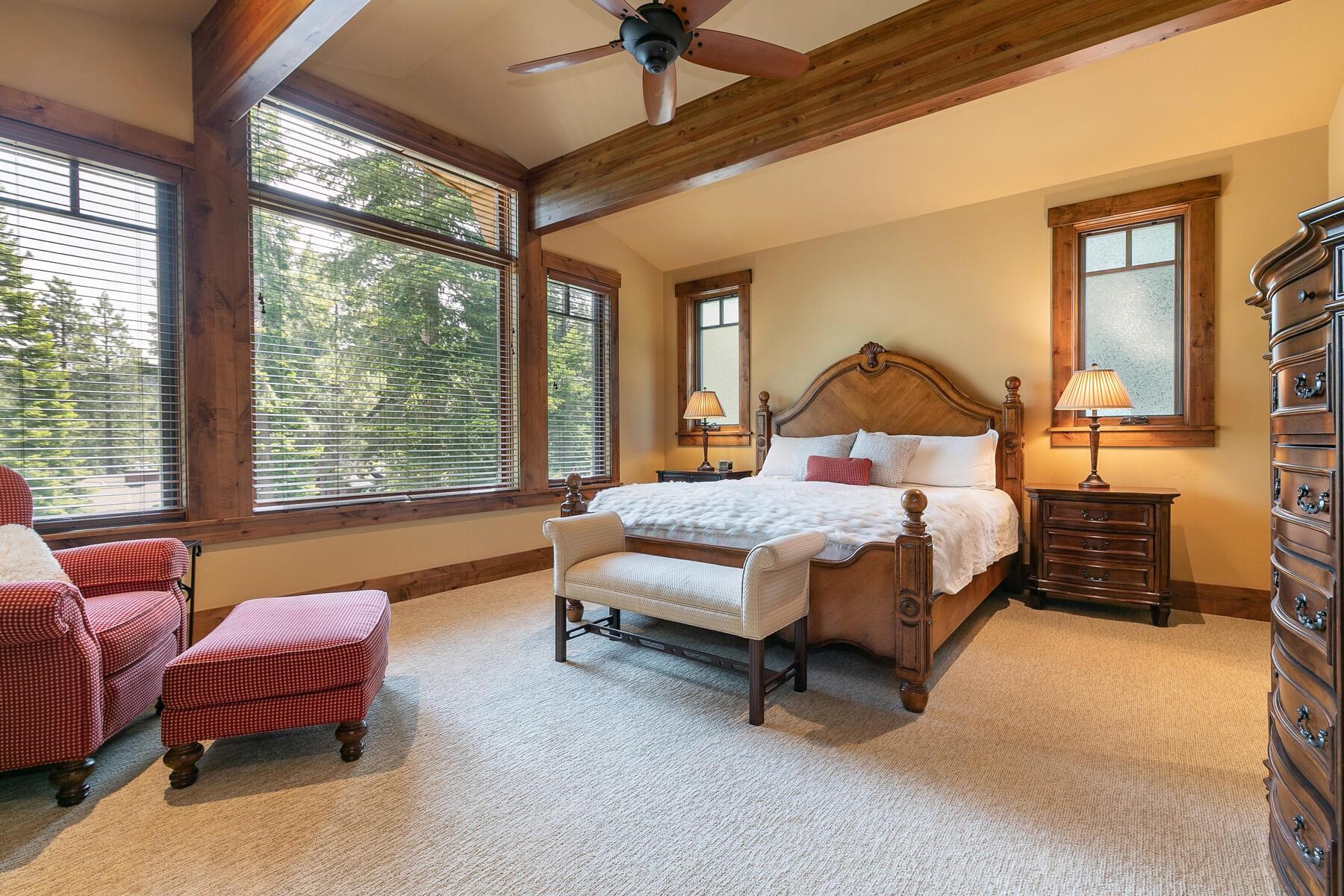 2105 Eagle Feather Truckee, CA 96161 - Photo 8 of 21 a bedroom with a bed and large windows