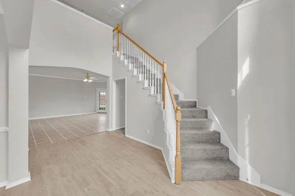 a view of an entryway with staircase