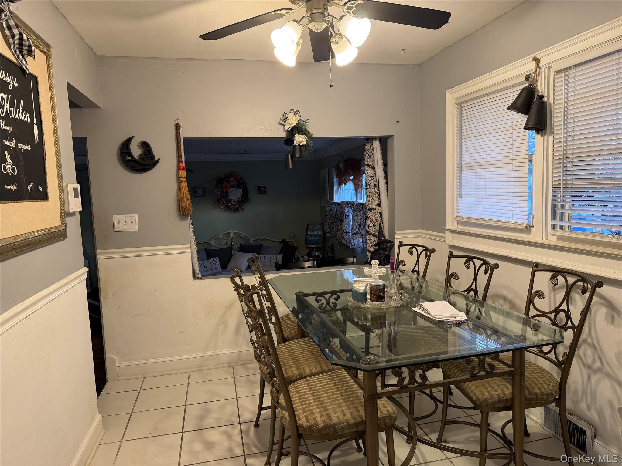 11 Bittermint Street Islip, NY 11751 - Photo 11 of 12 a dining room with furniture and window
