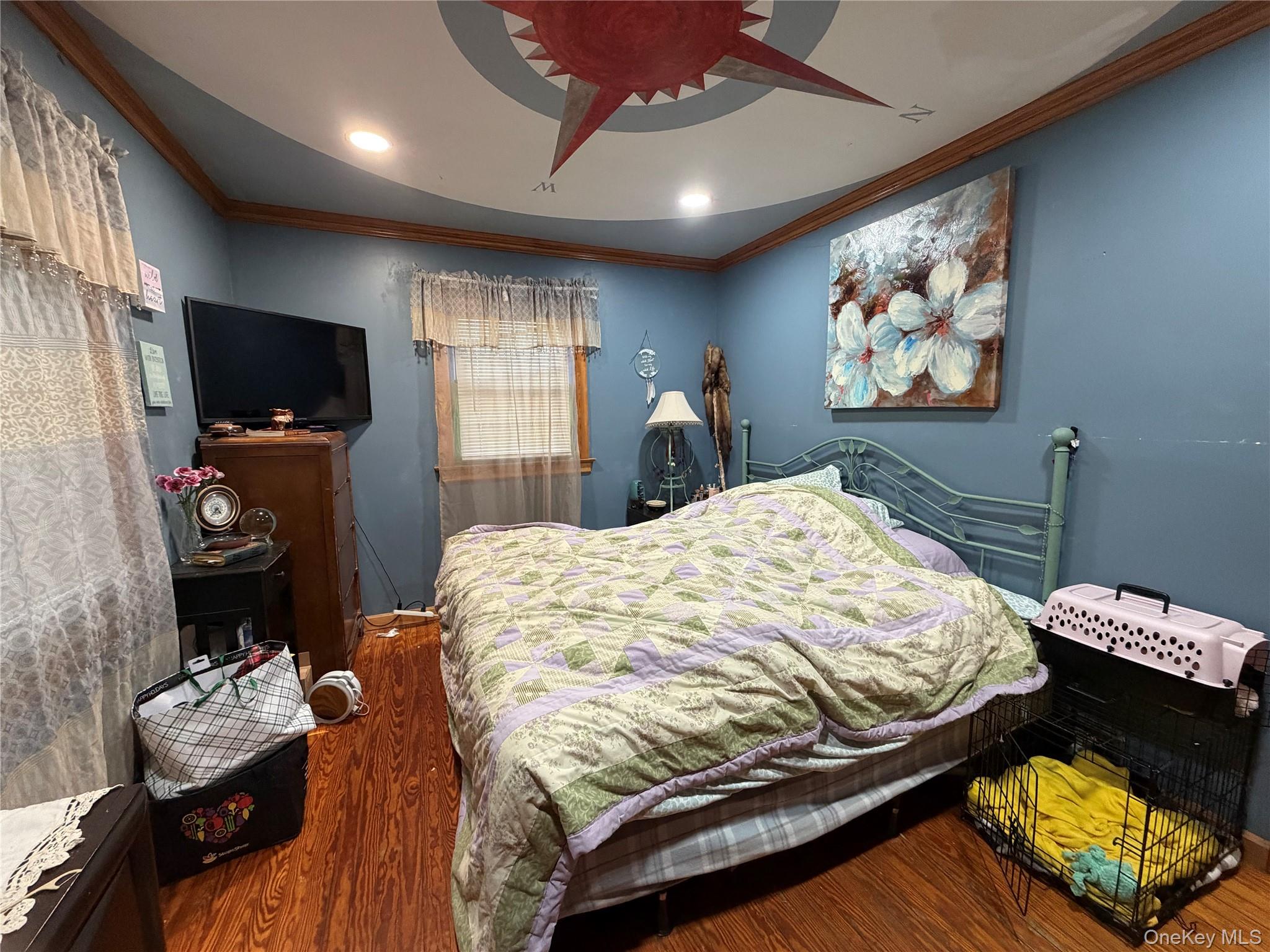 11 Bittermint Street Islip, NY 11751 - Photo 4 of 12 a bedroom with a bed and furniture