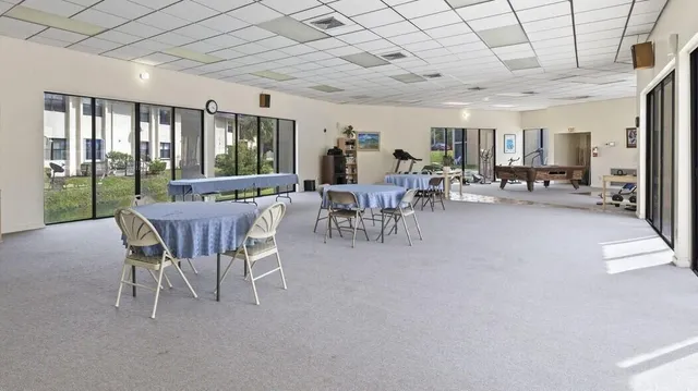 a view of a park with houses