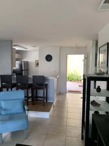 a view of kitchen with furniture and window