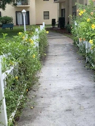 a house view with a outdoor space