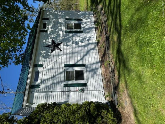 95 Upper Wisner Road Warwick, NY 10990 - Photo 2 of 14 a front view of a house with a garden