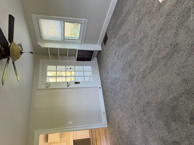 95 Upper Wisner Road Warwick, NY 10990 - Photo 5 of 14 an empty room with windows and ceiling fan