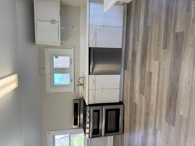 95 Upper Wisner Road Warwick, NY 10990 - Photo 7 of 14 a kitchen with granite countertop a stove and cabinets