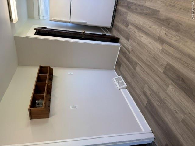 95 Upper Wisner Road Warwick, NY 10990 - Photo 9 of 14 a view of a hallway with wooden floor and a refrigerator