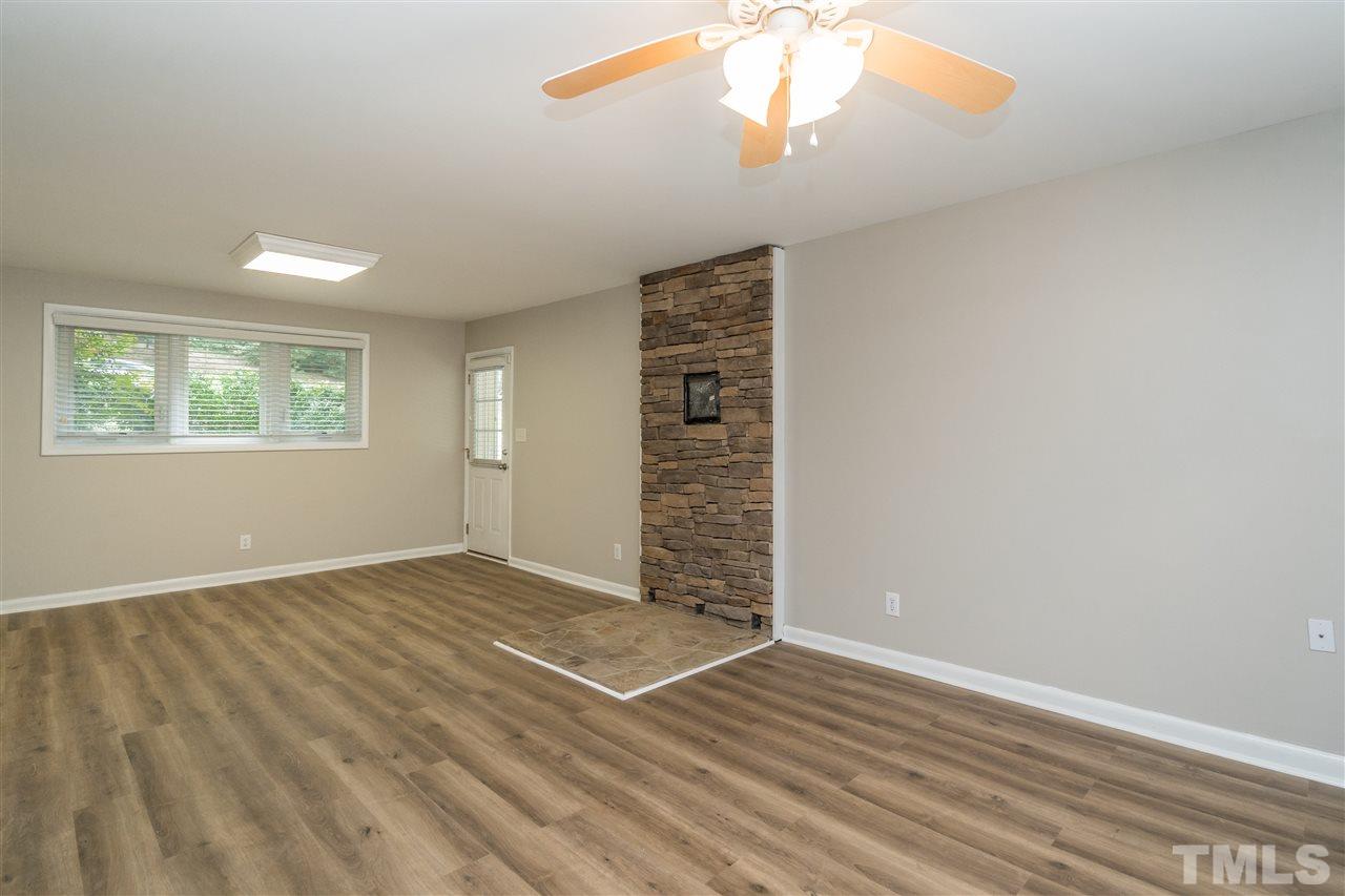6704 Winding Trail Raleigh, NC 27612 - Photo 22 of 30 an empty room with windows and closet
