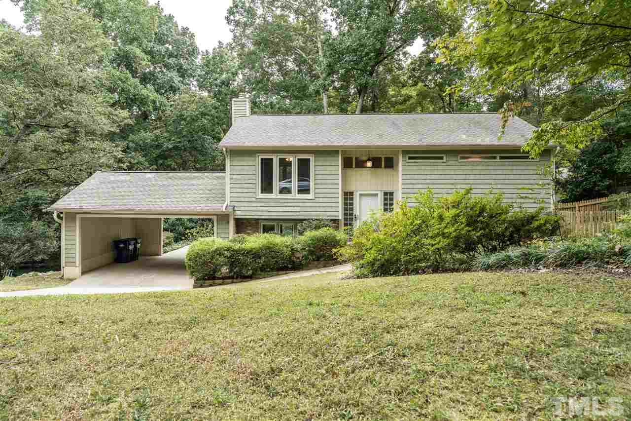 6704 Winding Trail Raleigh, NC 27612 - Photo 30 of 30 a view of a house with yard and plants
