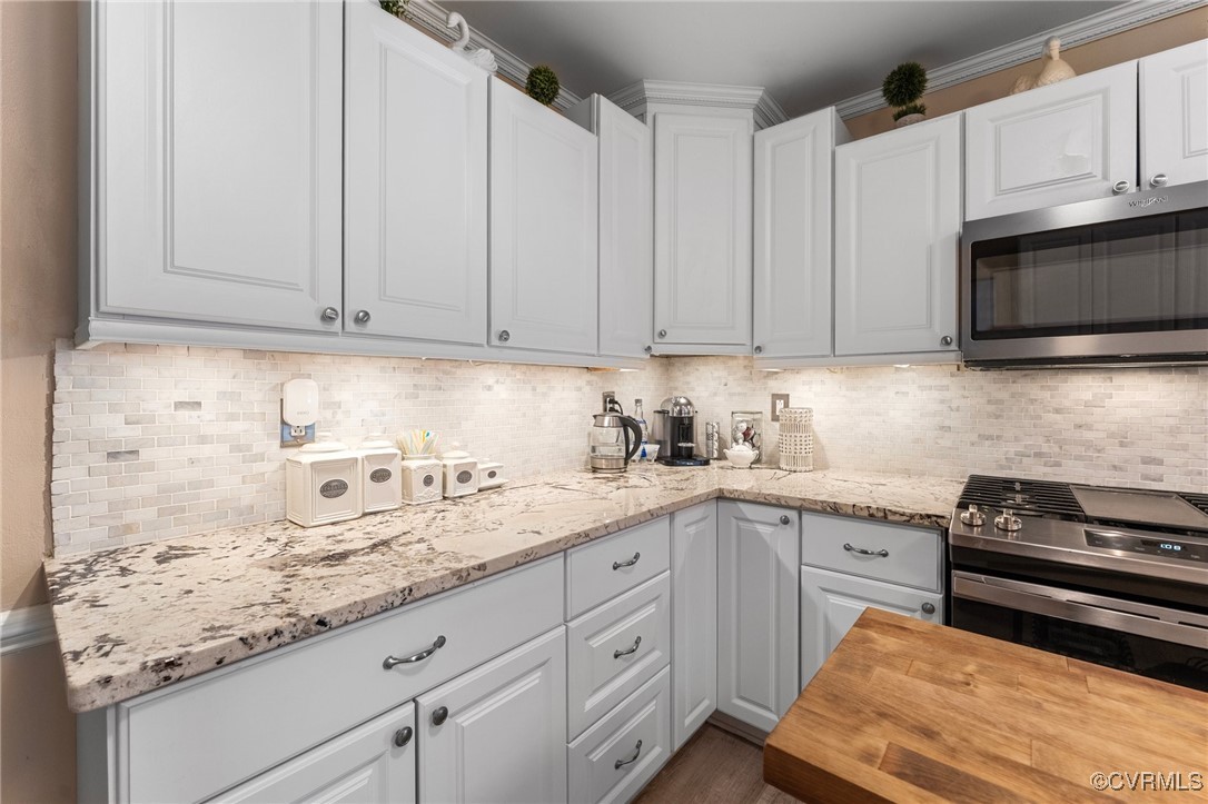 200 St Georges Boulevard Williamsburg, VA 23185 - Photo 11 of 49 Kitchen with tasteful backsplash, appliances with