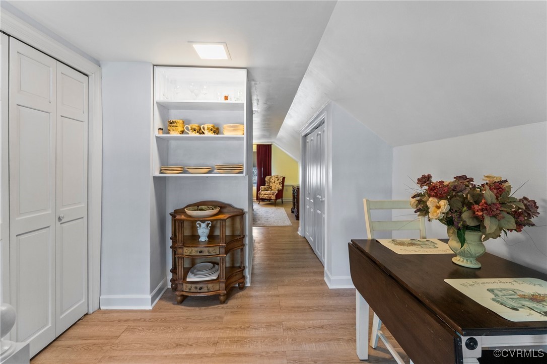 200 St Georges Boulevard Williamsburg, VA 23185 - Photo 17 of 49 Hallway featuring light wood-type flooring, lofted