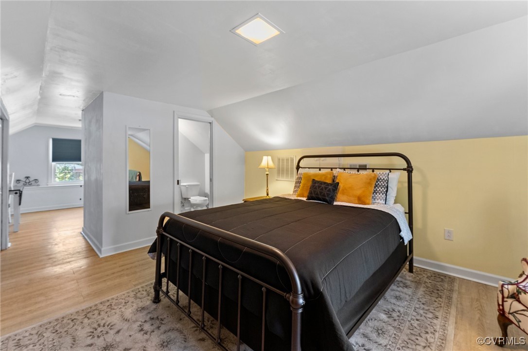 200 St Georges Boulevard Williamsburg, VA 23185 - Photo 19 of 49 Bedroom featuring baseboards, wood finished floors