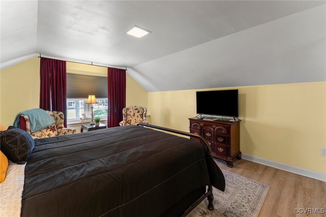 200 St Georges Boulevard Williamsburg, VA 23185 - Photo 21 of 49 Bedroom featuring vaulted ceiling, baseboards, and